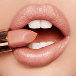 Hydrating luxury lipstick Penelope Pink swatch on hand