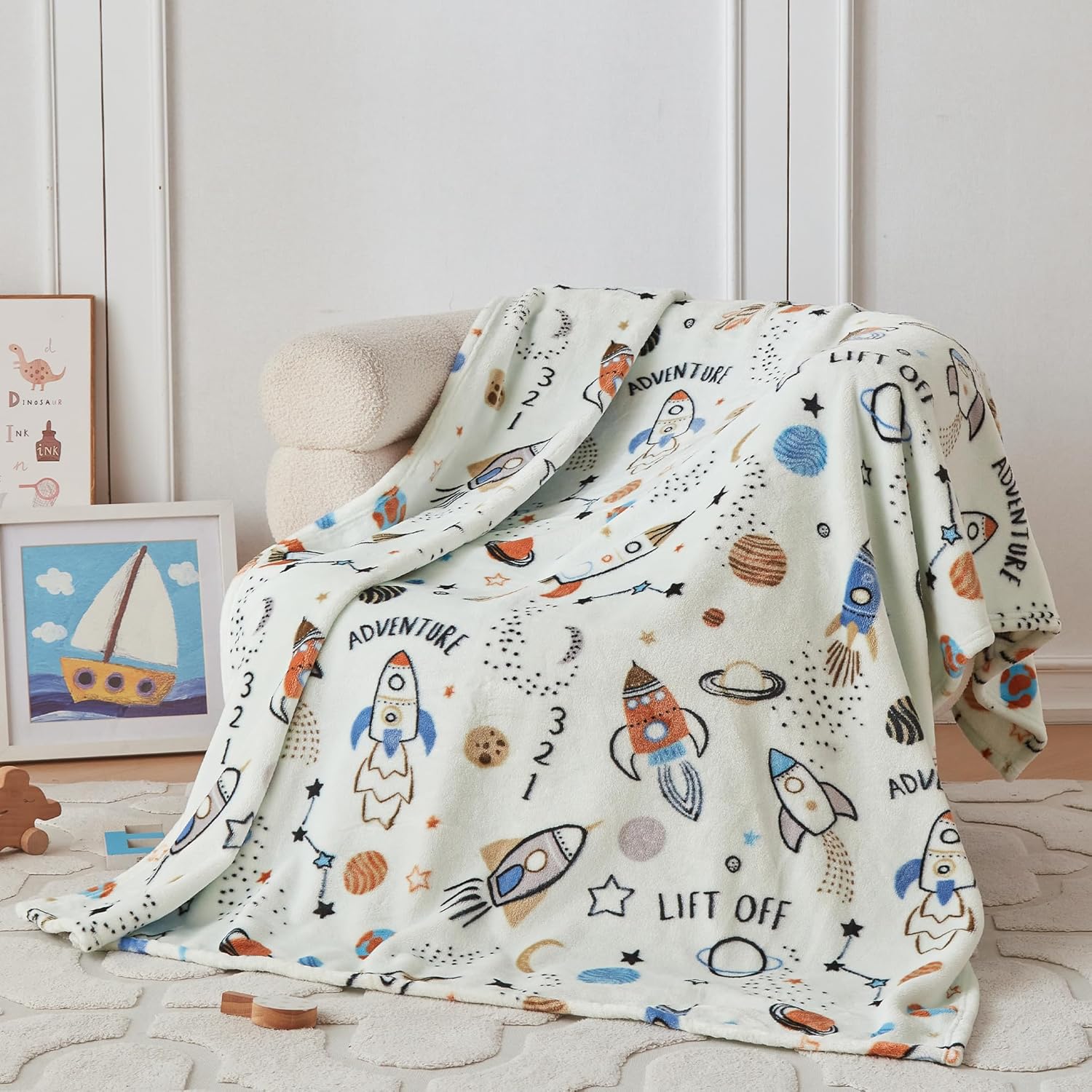 COOVA Kids Throw Blanket front view showcasing the vibrant green spaceship and astronaut design