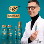 OGX ProGrowth Peptide hair thickening system bottle on a solid clean background