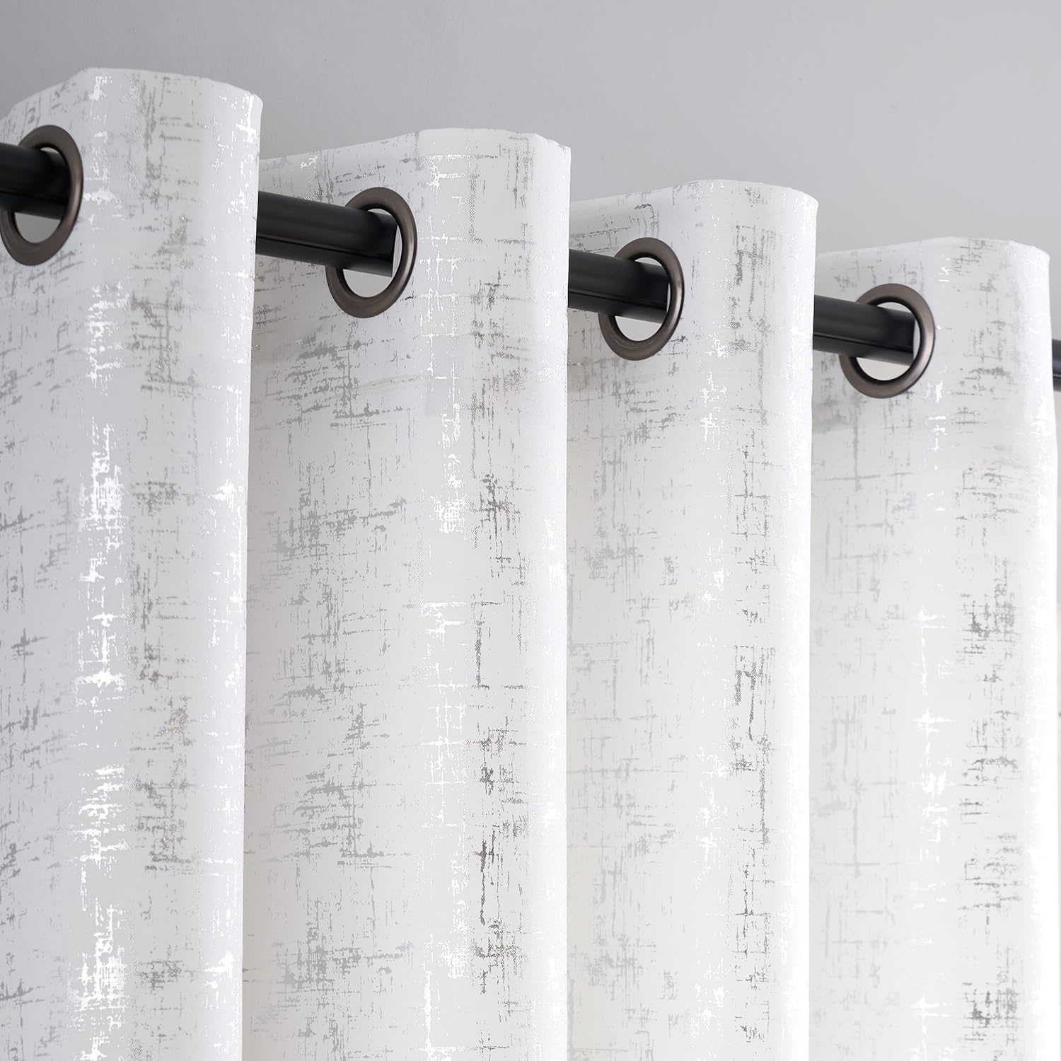 Taisier Home silver foil print linen textured curtains front view in a white and silver nursery setting.