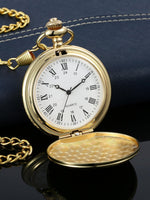 Close up view of the intricate floral engraving on the pocket watch case