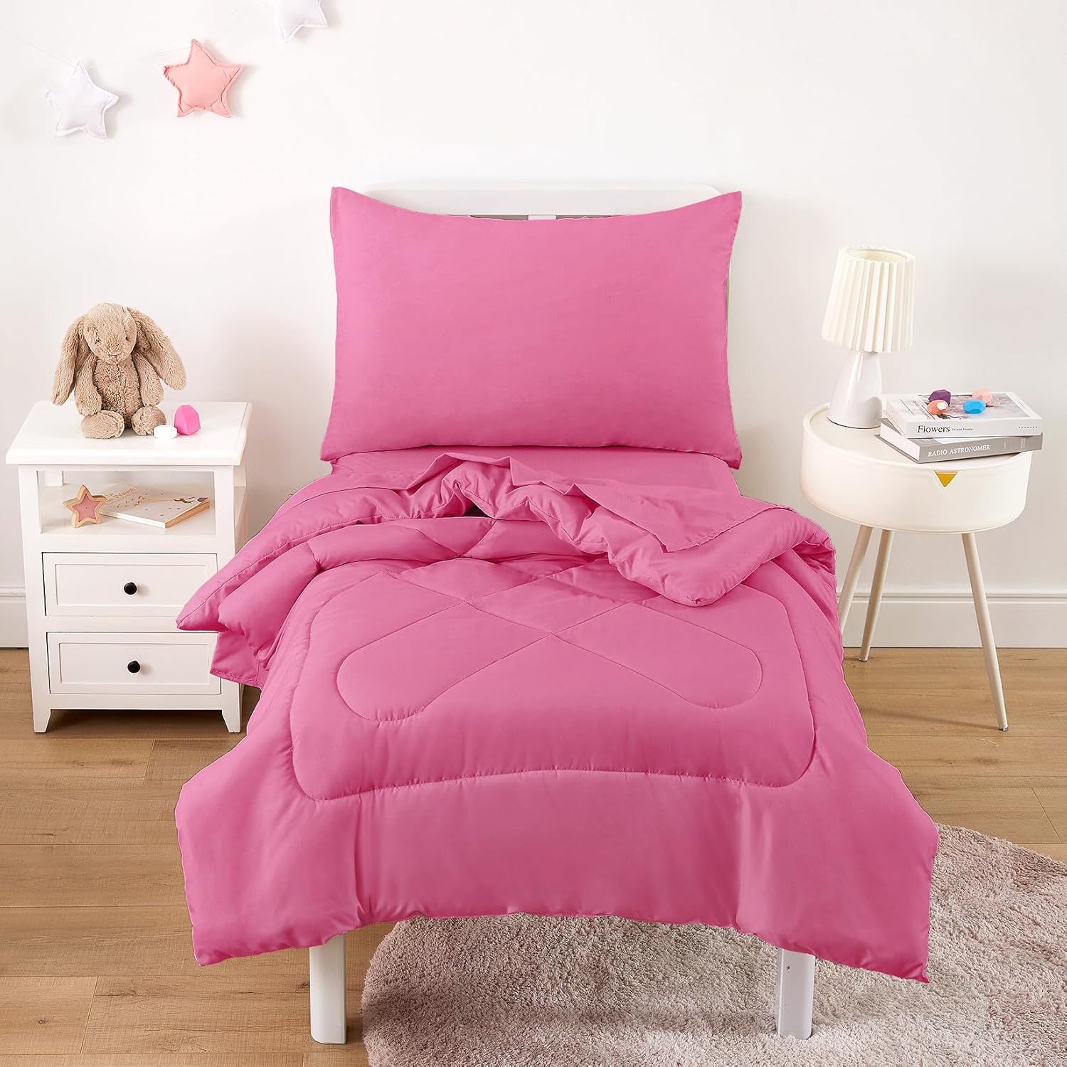 Wake In Cloud toddler bedding set hot pink front view on a standard crib mattress