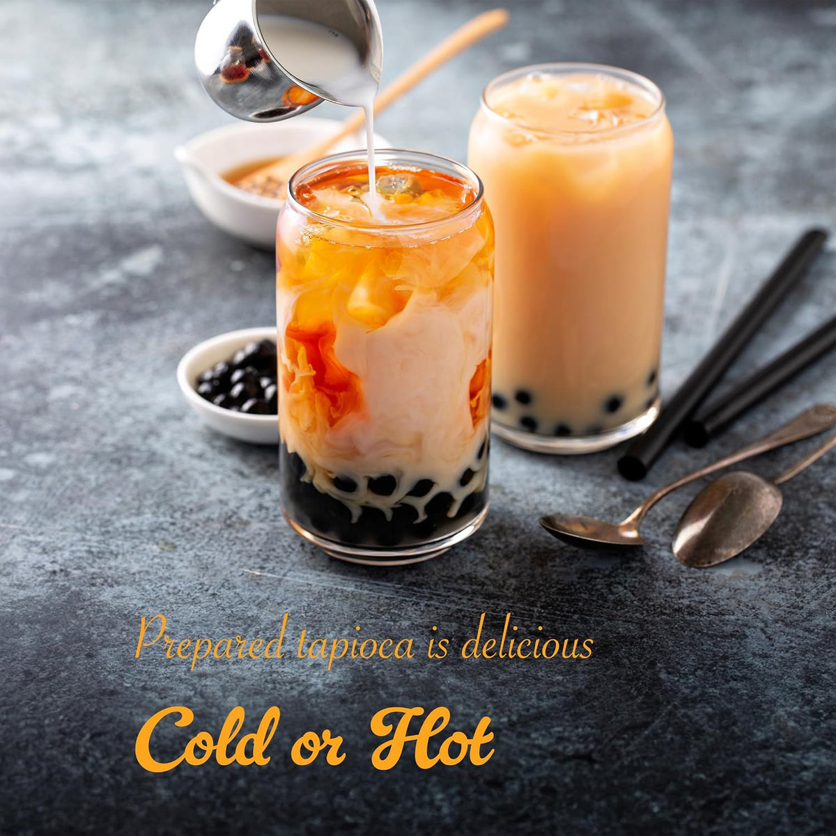 Authentic cooked black sugar boba pearls in iced milk tea glass