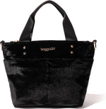 Baggallini mini carryall tote worn as crossbody