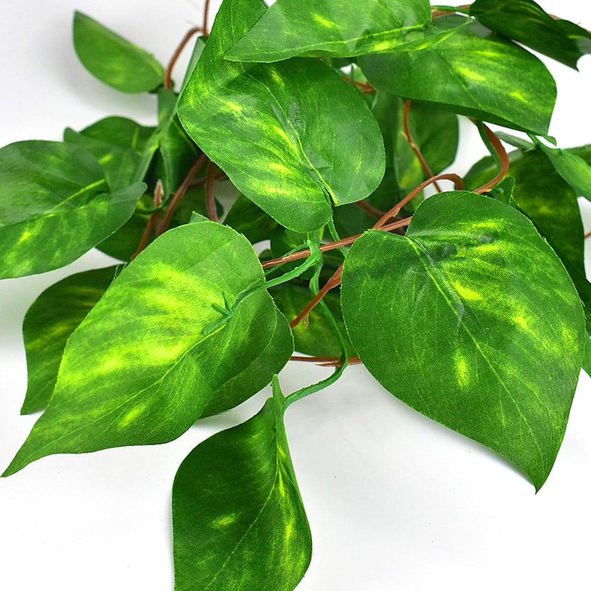 Lifelike artificial greenery for snake and lizard enclosures