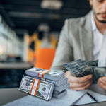 Marsrut money bands securing a stack of cash for transport