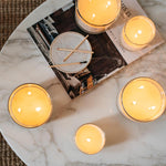 Neom luxury scented candle top view displaying wax pool