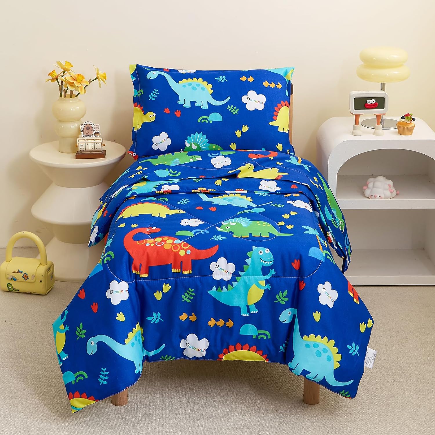 MyPerfectClassroom Caressma navy toddler bedding set front view showcasing the dinosaur comforter