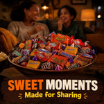 Doomi imported bulk candy selection featuring mini Snickers Twix and KitKat bars