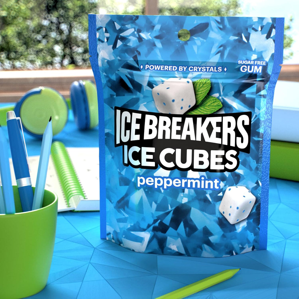 Side profile of the 8.11 ounce ICE BREAKERS Ice Cubes sharing size package