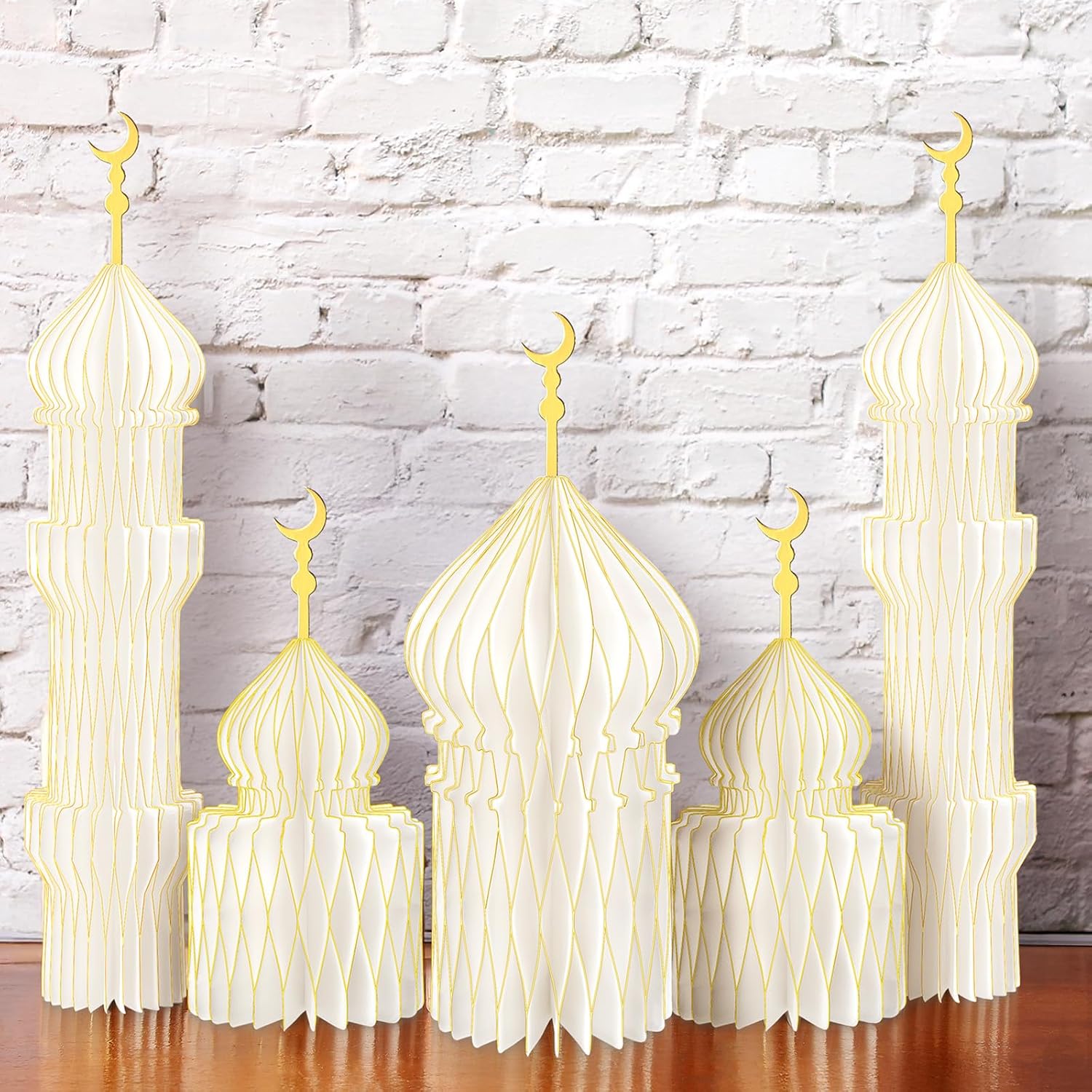 MotiMind Ramadan party decorations 5 piece white and gold 3D honeycomb centerpieces front view on a festive dining table.