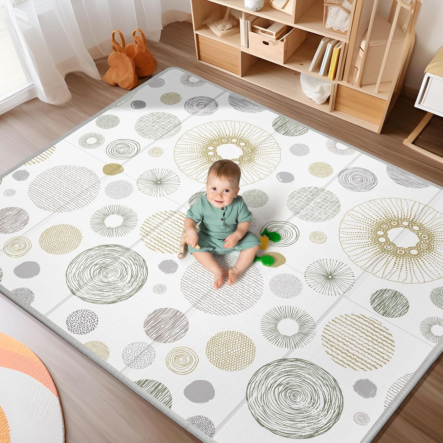 Piglog extra large foldable baby play mat front view showing green and gold circle pattern