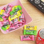 Individually wrapped cherry sour apple and banana taffy sticks