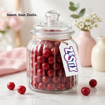 Zestix cherry sours candy arranged beautifully in a glass jar for a wedding dessert table