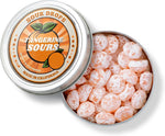 Three reusable tins of Sour Drops candy assorted flavors