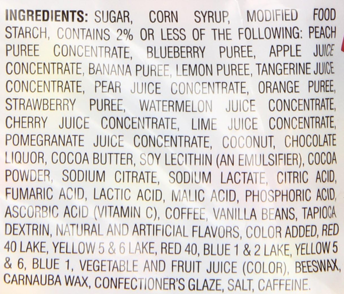 A colorful assortment of gluten free Jelly Belly jelly beans scattered next to the 7 Ounce bag.