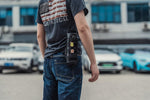 Tactical Geek EXT11 water bottle pouch attached to backpack