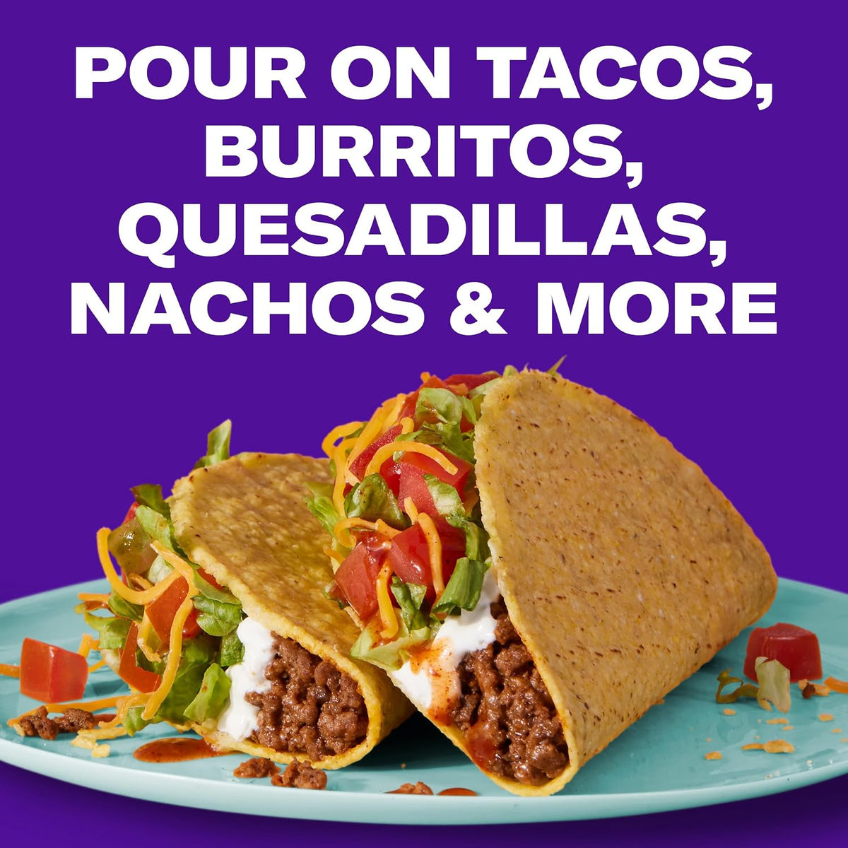 Taco Bell hot sauce bottle next to tacos