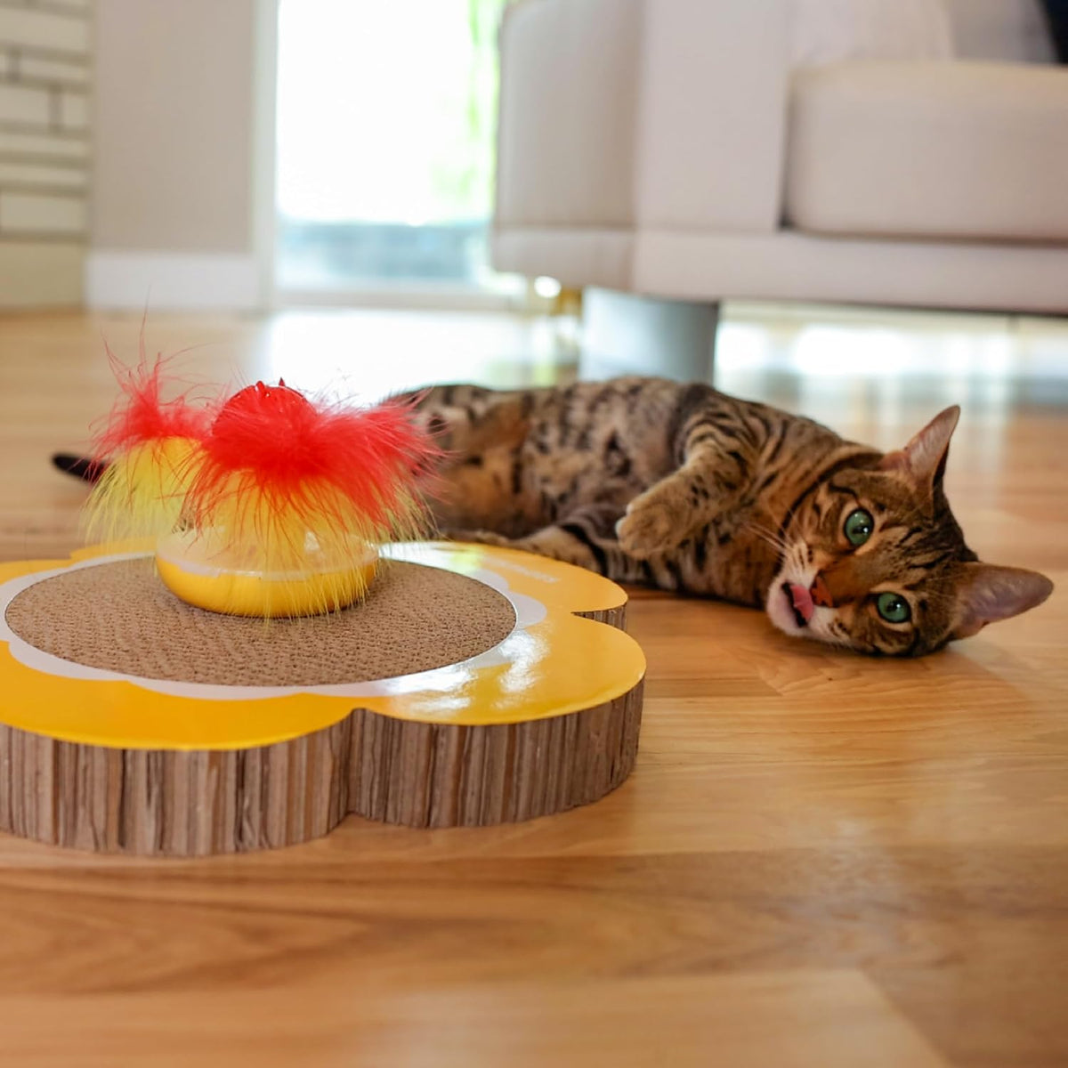 Catstages cat scratcher with spinning catnip topper angled action view