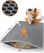 Powools cat litter mat being cleaned with running water.