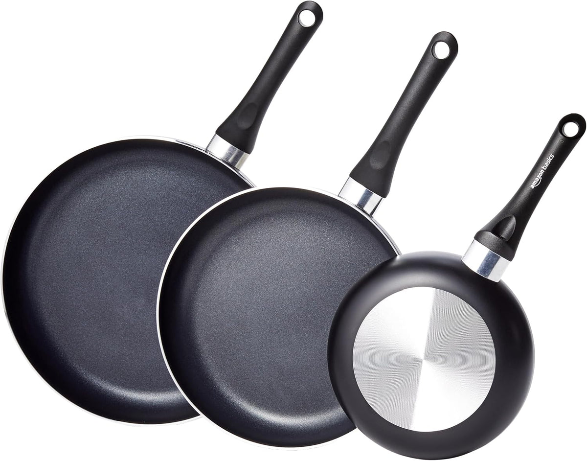 Amazon Basics 15-piece cookware set arranged for kitchen display