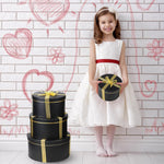 Harloon cylindrical gift boxes showing all five assorted sizes