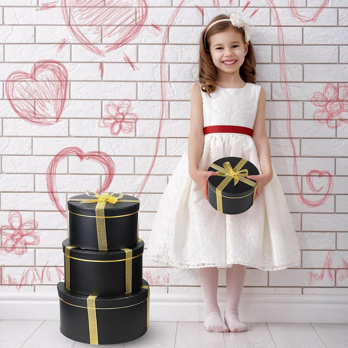 Harloon cylindrical gift boxes showing all five assorted sizes