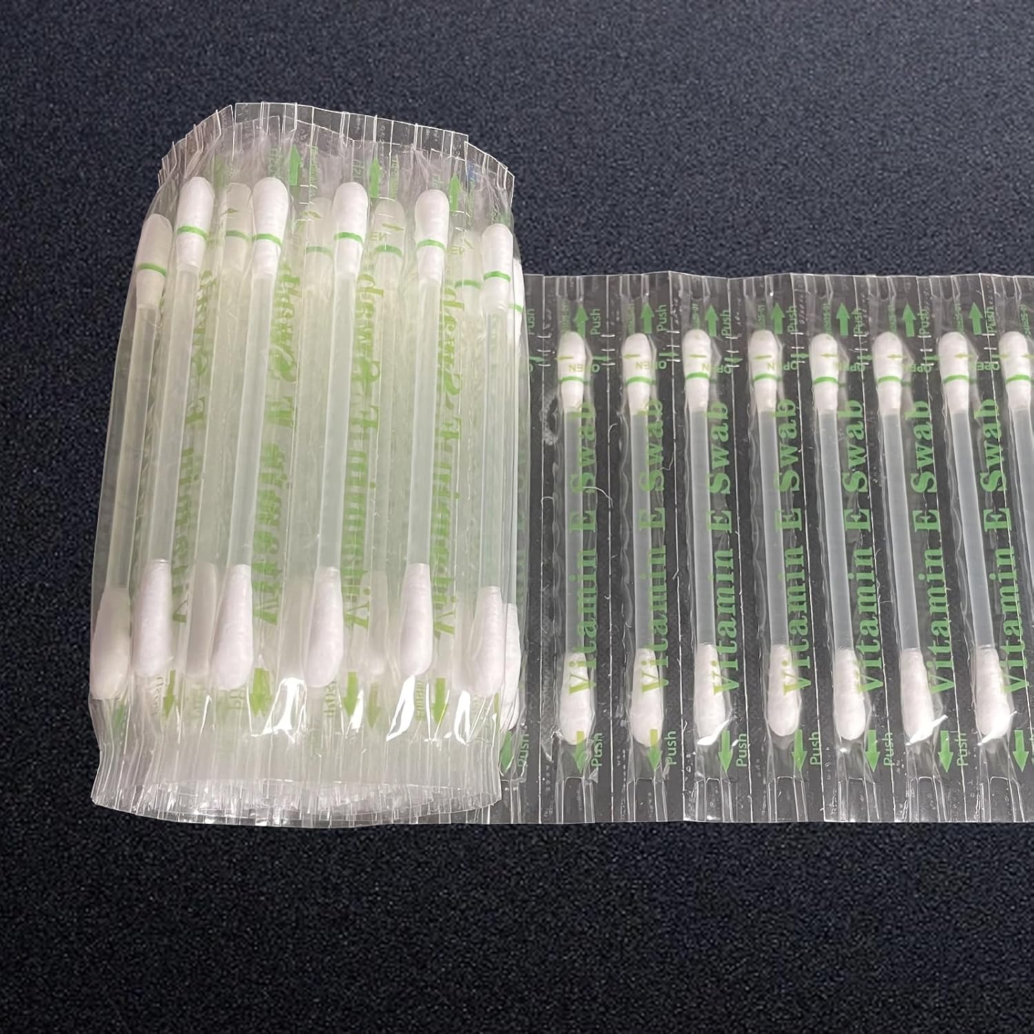 Songfir Vitamin E lips oil swabs stick 100 pieces box front view showing individual packaging