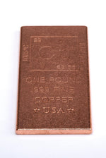 Unique Metals 16 Ounce Pure Copper Ingot on office desk