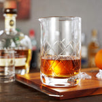 Side profile of the Viski mixing glass showcasing geometric faceted sides.
