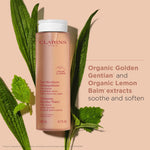 Dista-USA Clarins Cleansing Micellar Water cap and pump mechanism detail