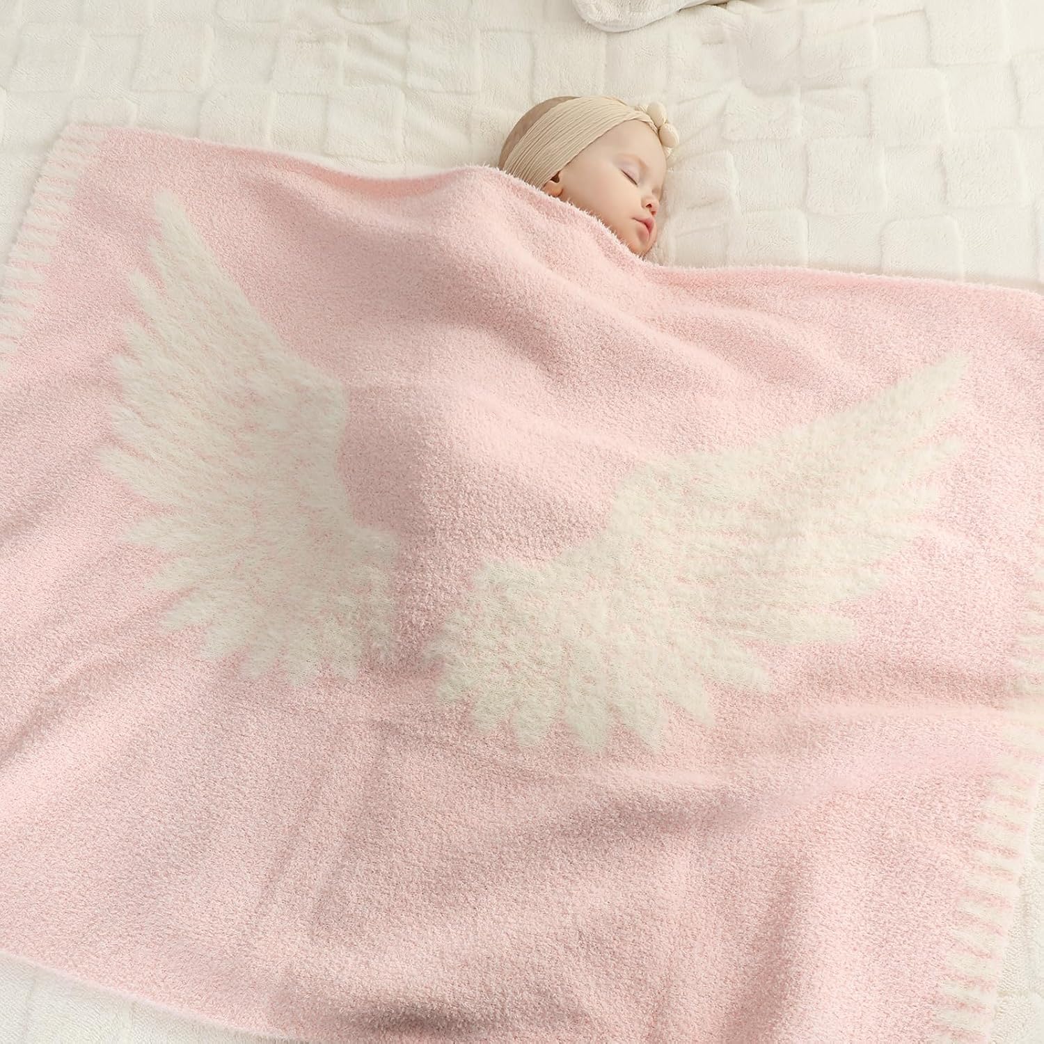 Snuggle Sac Angel Wings Knitted Throw Blanket Pink front view showing plush microfiber texture.