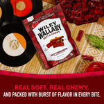 Authentic imported Wiley Wallaby gourmet hot cinnamon candy twists poured out onto a table.