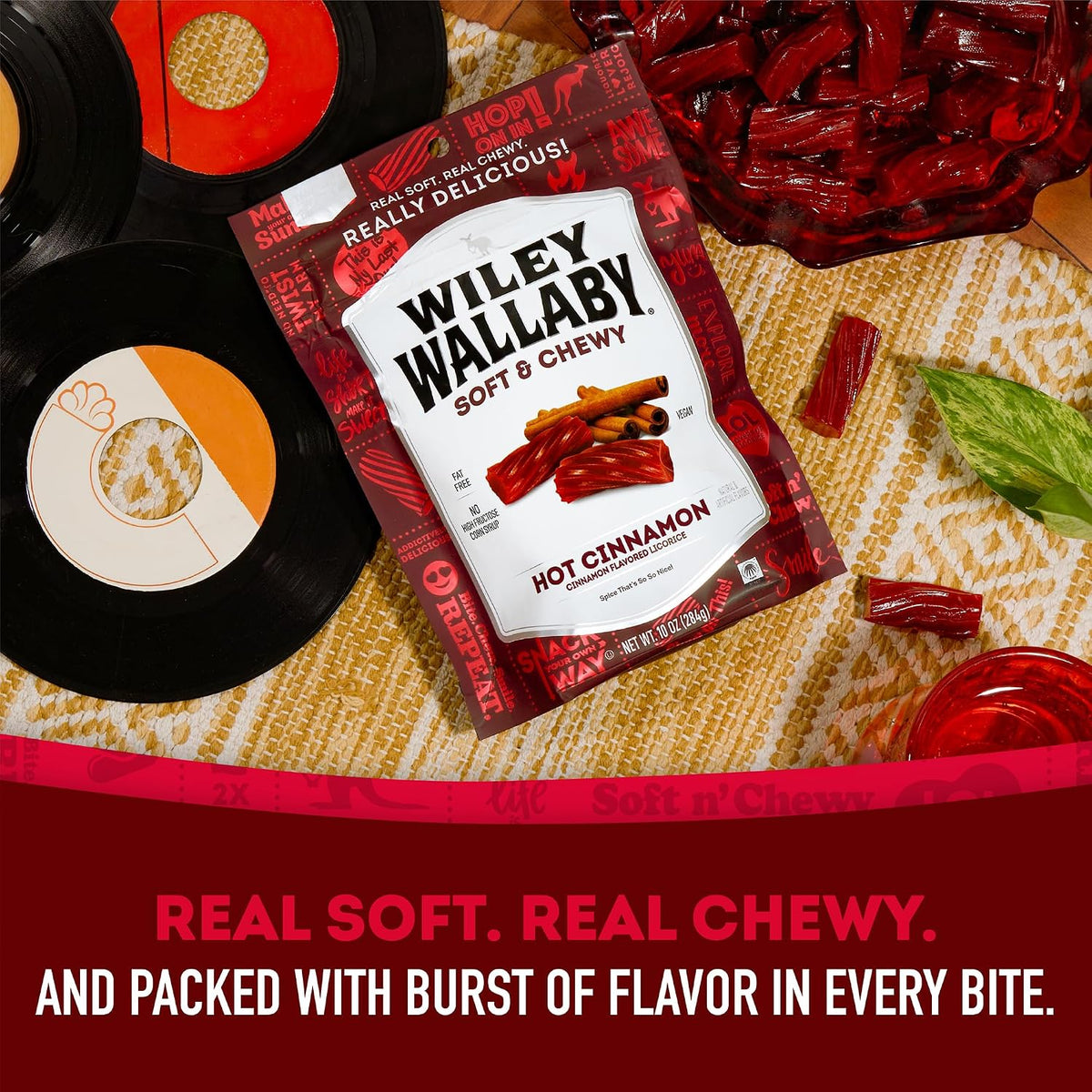 Authentic imported Wiley Wallaby gourmet hot cinnamon candy twists poured out onto a table.