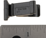 Close up of metal and plastic mechanism on Dorman 47208 spring