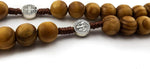 Full length display of the unisex Catholic prayer chaplet string and medals