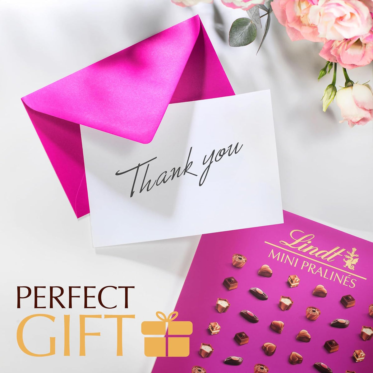 Bite-sized luxury Lindt pralines arranged neatly inside the elegant gift box.