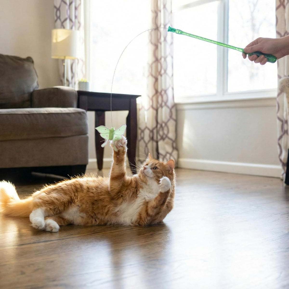 Catstages flutter bug wand showing flexible wire and moth design