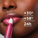 Clarins lip gloss cushion applicator close-up detail.