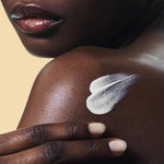 Clarins broad spectrum sunscreen lotion bottle side angle view
