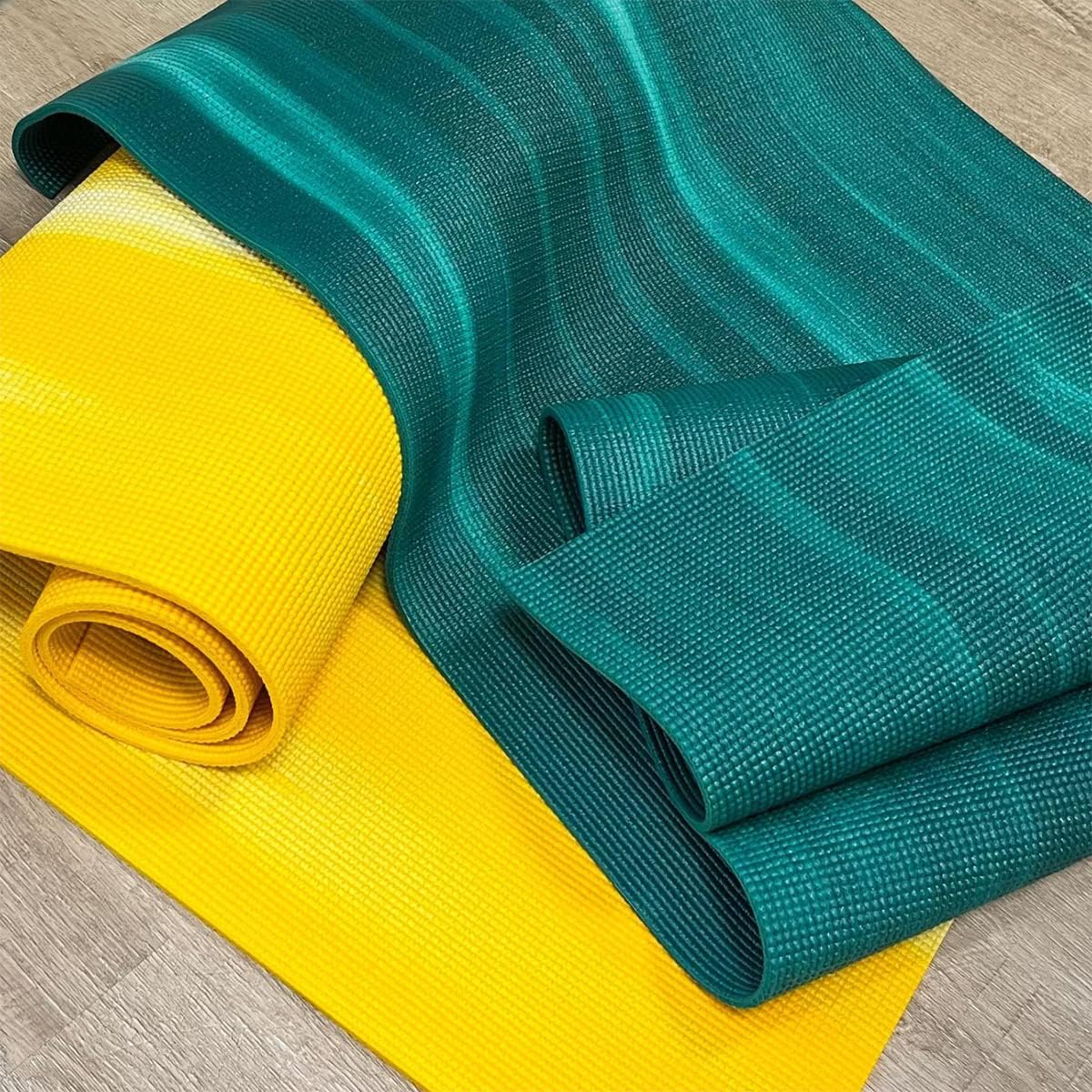 Hugger Mugger Nature Ultra Yoga Mat rolled up showing texture