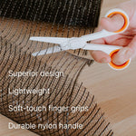 Slice ceramic scissors held in hand demonstrating ergonomic grip