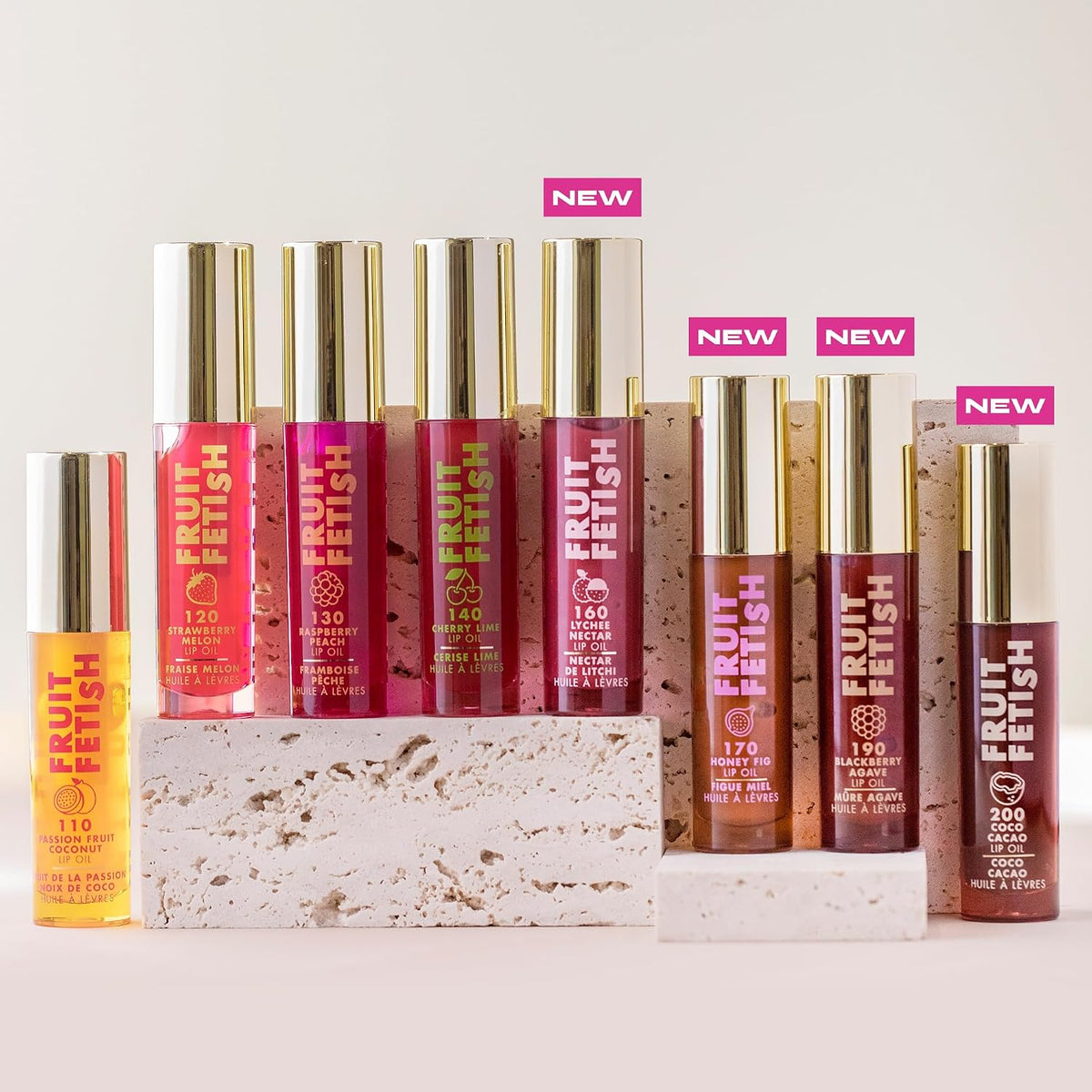 Model applying Milani tinted lip gloss