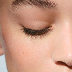 Dista-USA Clarins Cleansing Micellar Water texture demonstration on cotton pad