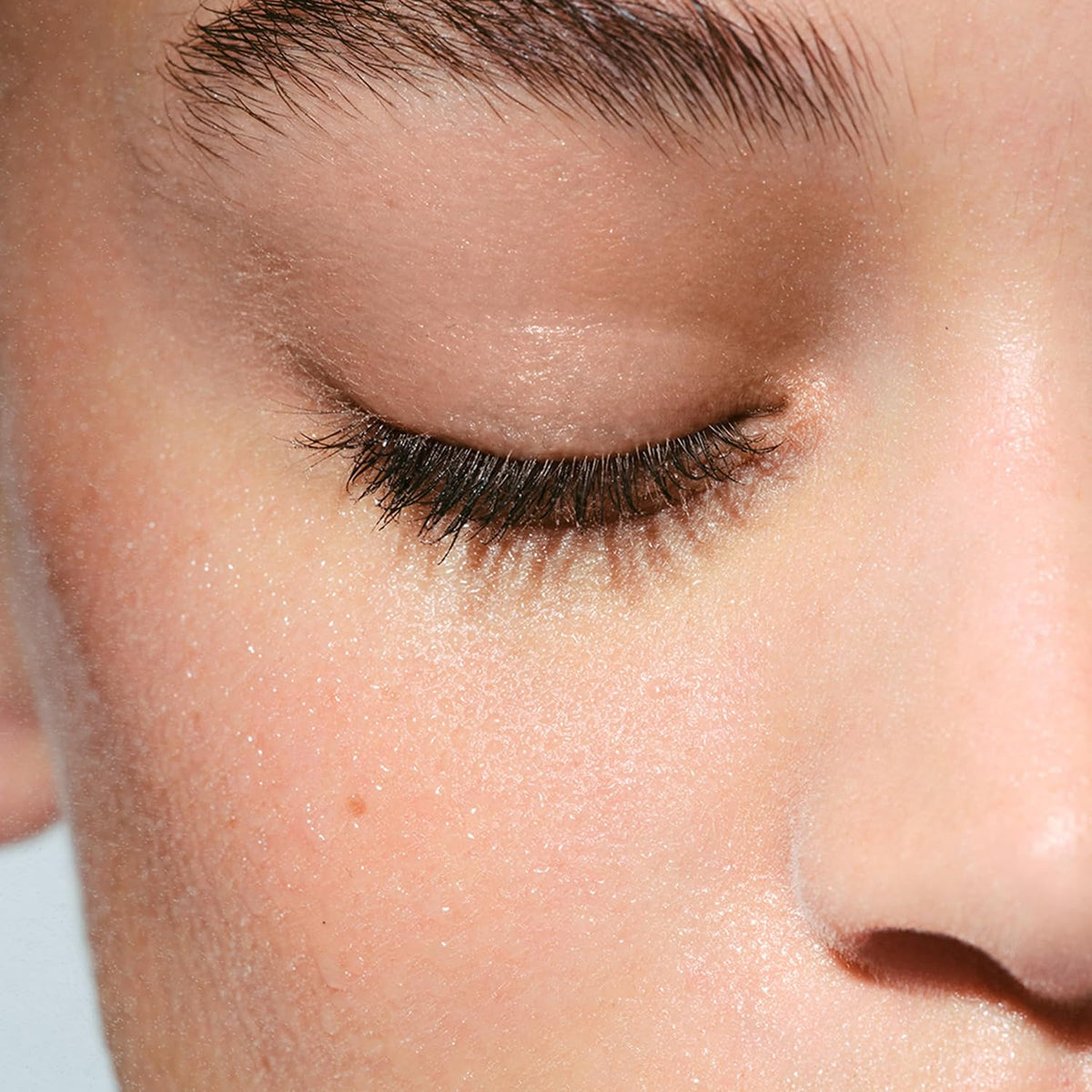 Dista-USA Clarins Cleansing Micellar Water texture demonstration on cotton pad