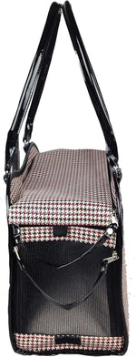 Small dog sitting inside Pet Life exquisite carrier