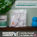 Good Harbor dog breeding kit items displayed including syringe and collection cone