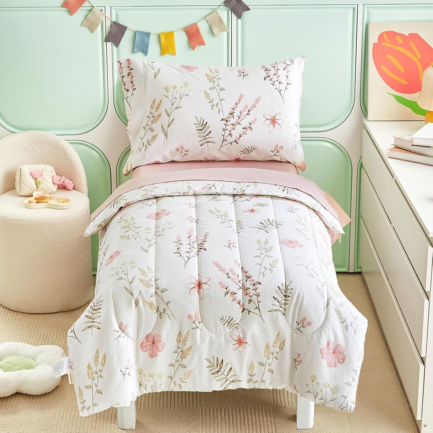 Joyreap 4 Piece Cotton Toddler Bedding Set front view featuring the pink flowers comforter on a bed