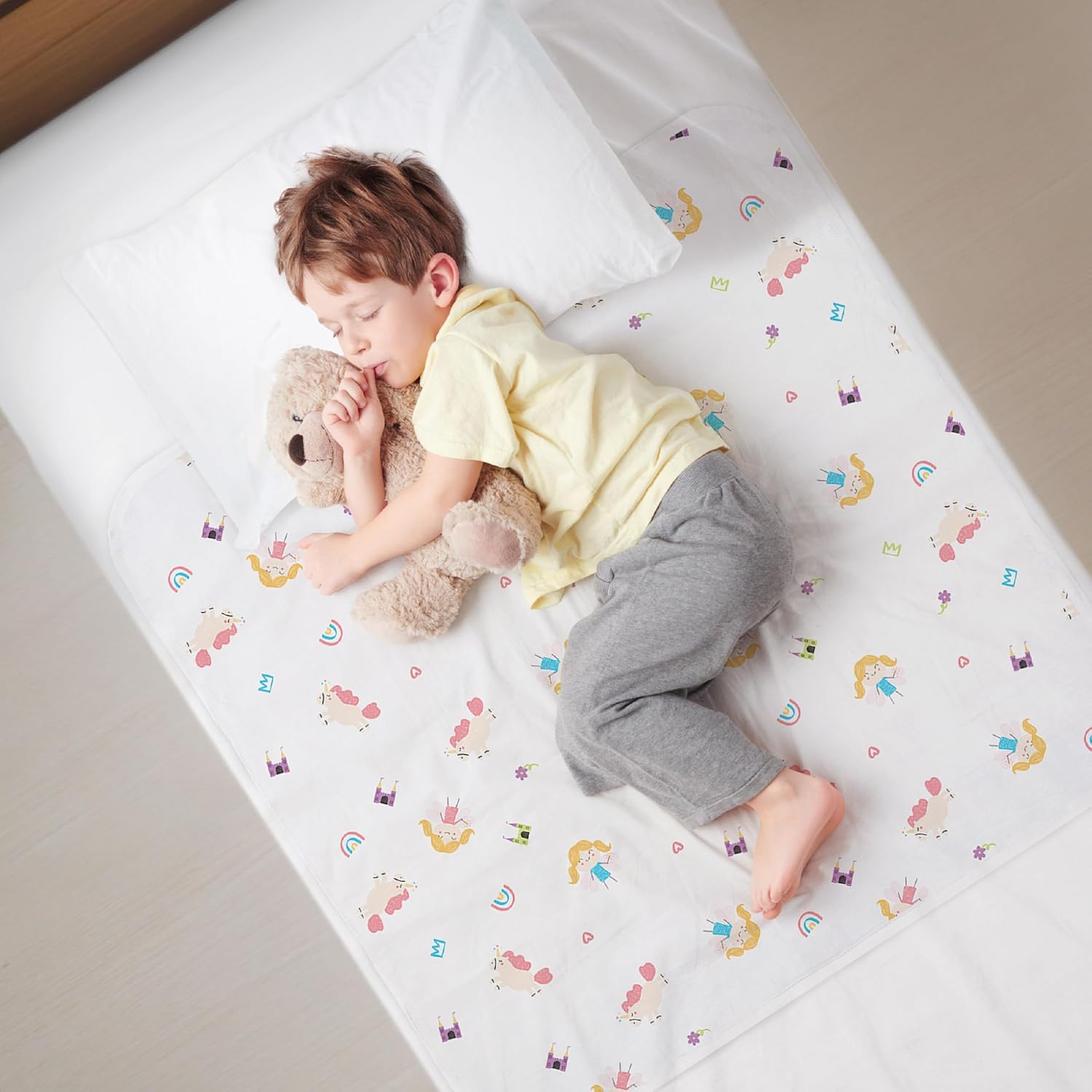 Think Good Tots potty training bed pad front view with fairy fantasy design
