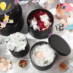 Harloon decorative hat box set displayed with floral arrangement